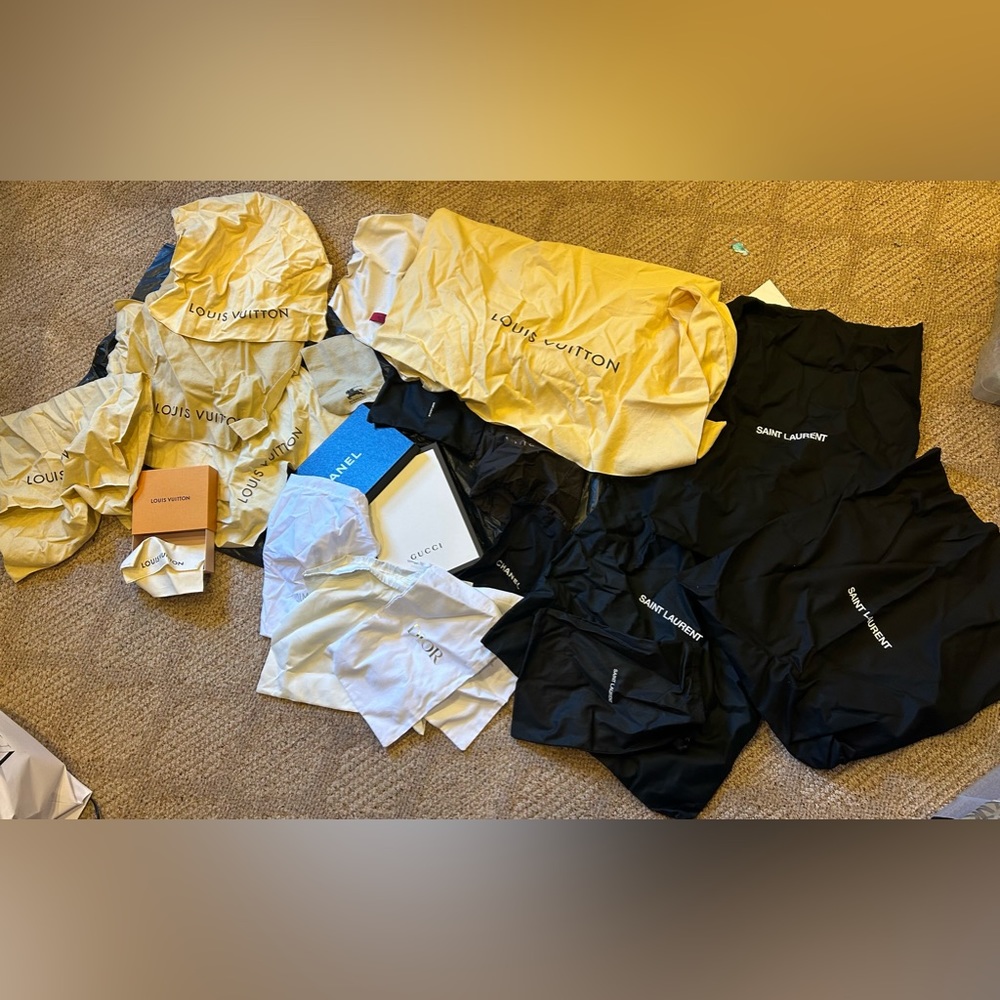 Assorted designer Authentic dust bags and packaging